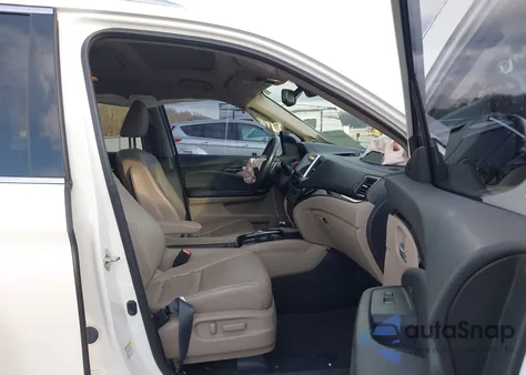 2016 Honda Pilot Elite z USA, uszkodzony, nr VIN 5FNYF6H01GB106574